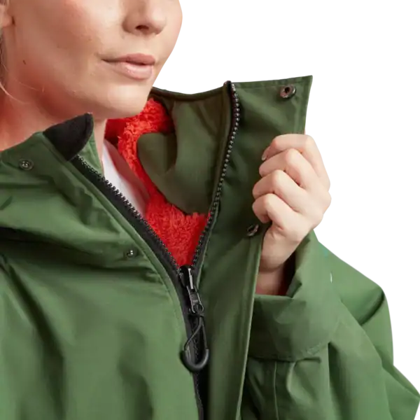 Veste imperméable verte pour paddle et activités nautiques, protection contre le vent et la pluie.