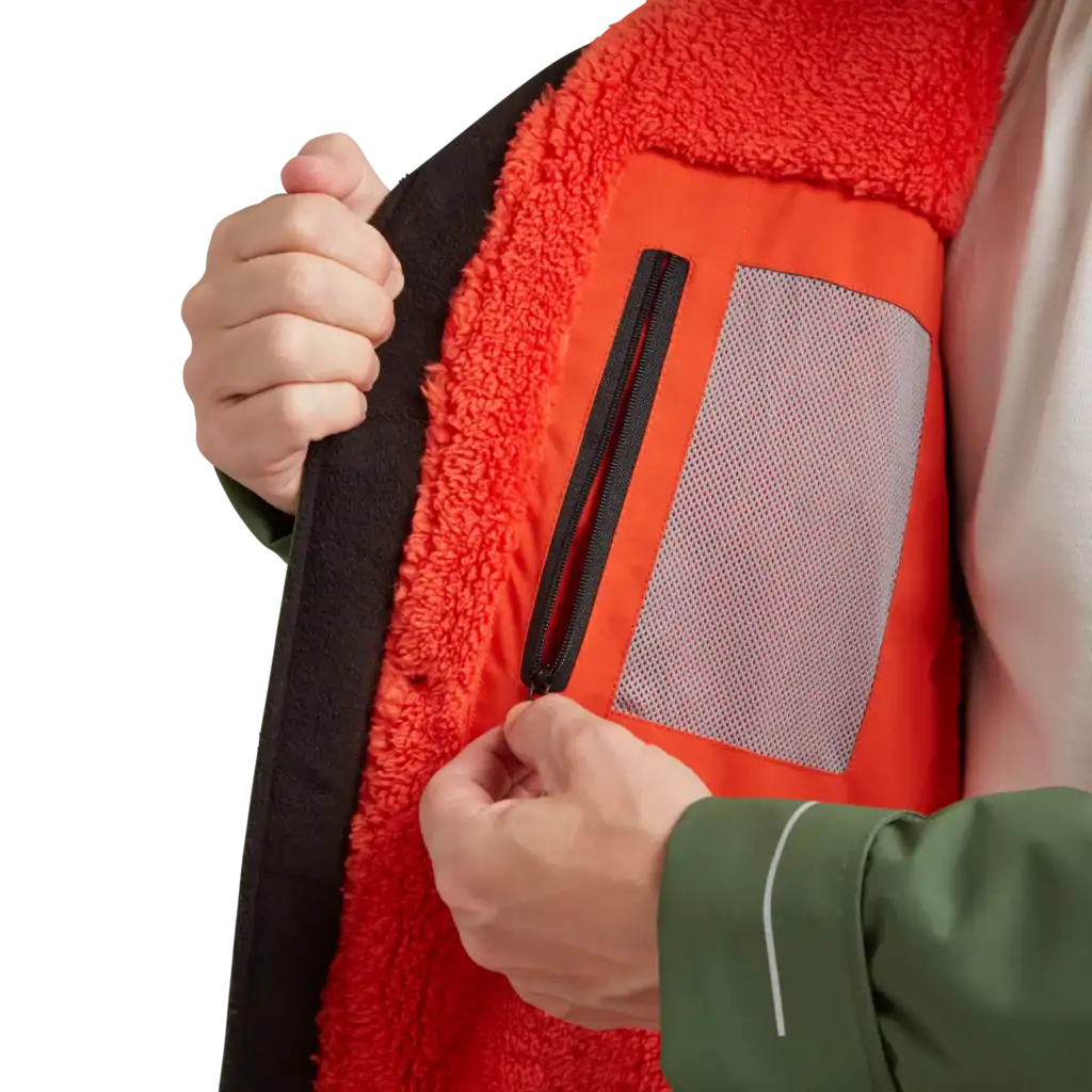 Veste polaire orange avec poche zippée pour vêtements de sport optimum.