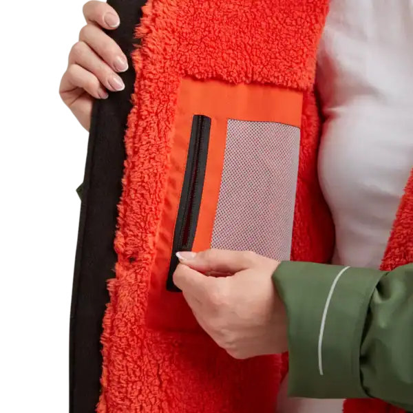 Veste polaire avec poche zippée pour accessoires opti, idéale pour la pratique du paddle.